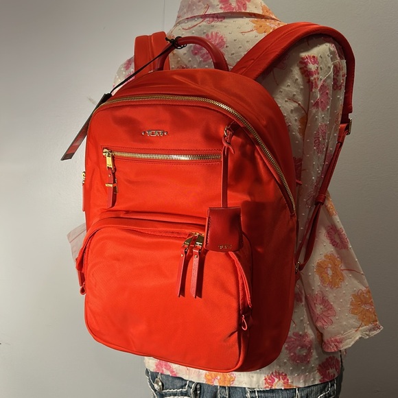 Tumi Handbags - NWT Tumi Carson Voyageur backpack in rare red